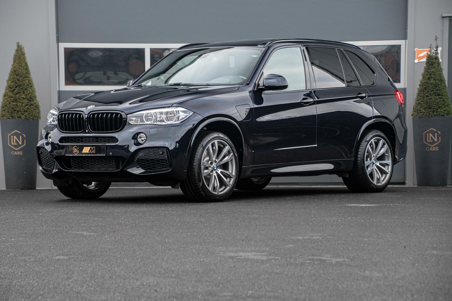 BMW X5 - xDrive40e iPerformance|Trekhaak|HUD|Pano|Sfeerverlich - AutoWereld.nl