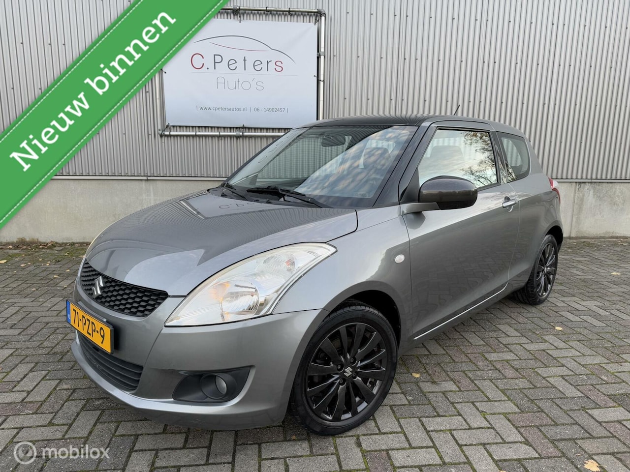 Suzuki Swift - 1.2 Exclusive 2011 / Climatecontrol / Cruisecontrol / Navigatie / Parkeersensoren / NAP - AutoWereld.nl