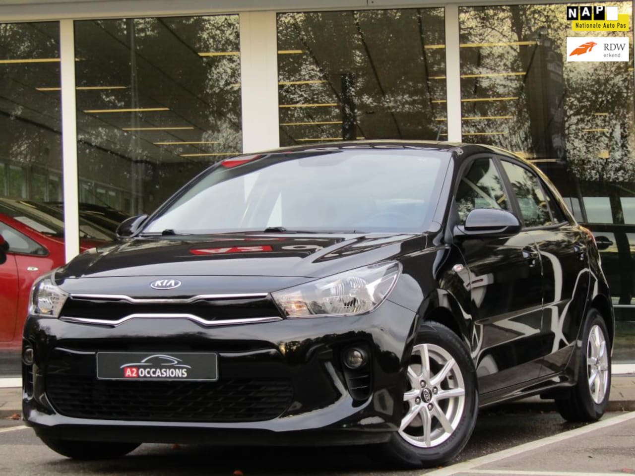 Kia Rio - 1.2 CVVT Cruise/Bluetooth/Stoel en stuurverwarming! - AutoWereld.nl