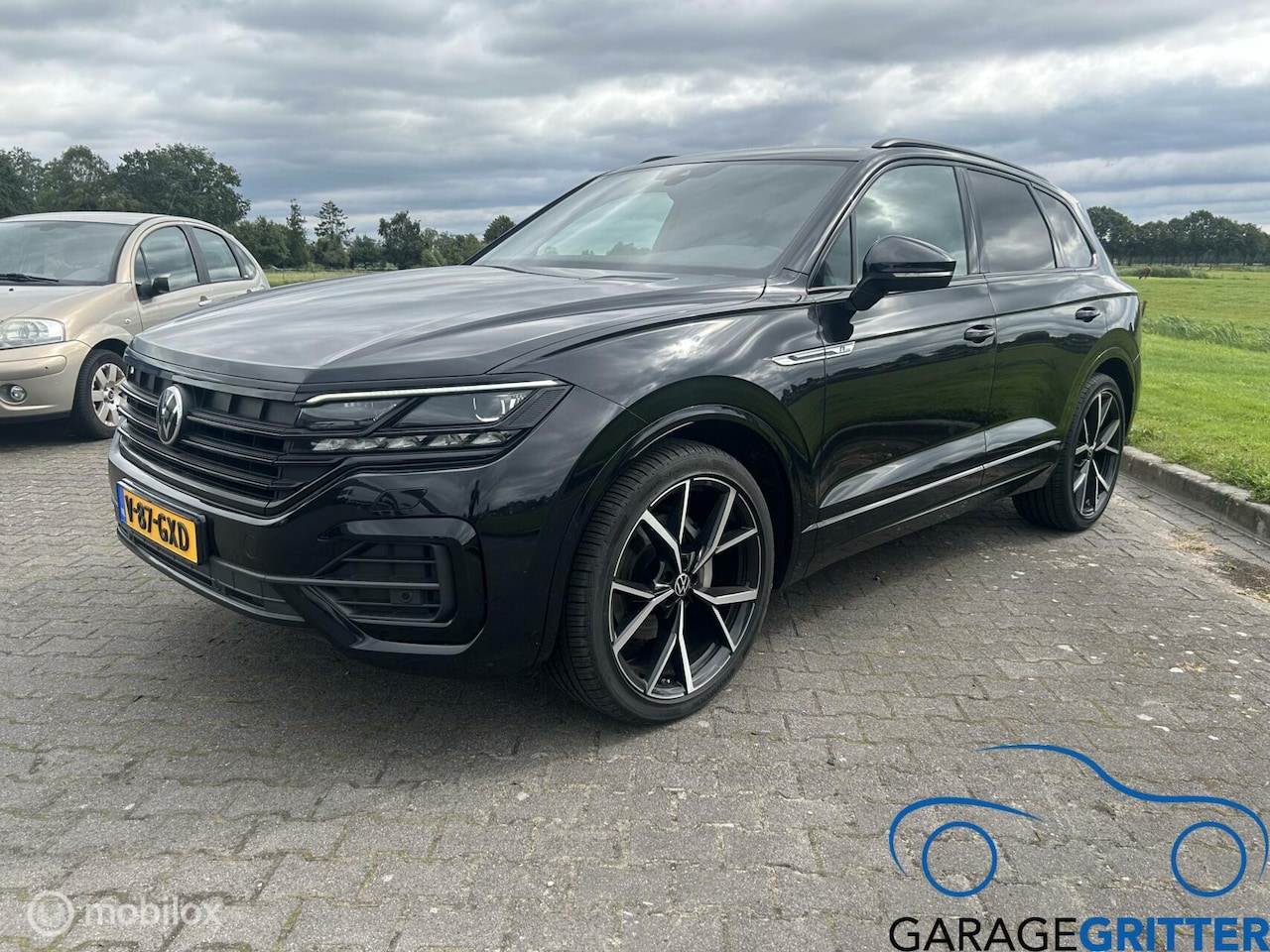 Volkswagen Touareg - 3.0 TDI 231pk R-Line Luchtvering - AutoWereld.nl