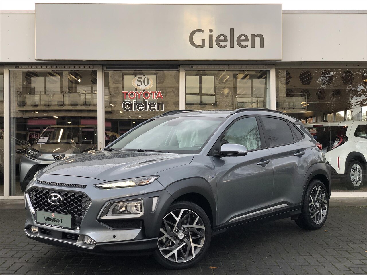 Hyundai Kona - GDI HEV Fashion | Trekhaak, Half leer, Stoel + Stuurverwarming, Navigatie, Carplay, Privac - AutoWereld.nl