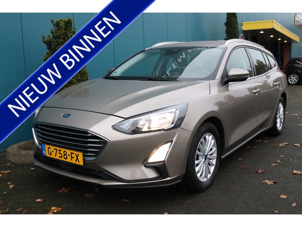 Ford Focus Wagon - 1.0 EcoBoost 125 PK Titanium Business ECC/CRUISE/STOELV/STUURV/ELEK.KLEP/CARPLAY/NAV/BLUET - AutoWereld.nl