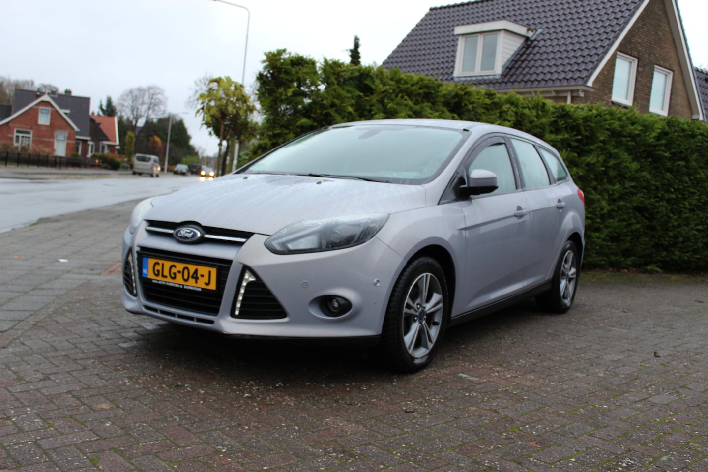 Ford Focus Wagon - 1.0i "Titanium" LMV - Airco - Trekhaak !!! 125 Pk - AutoWereld.nl