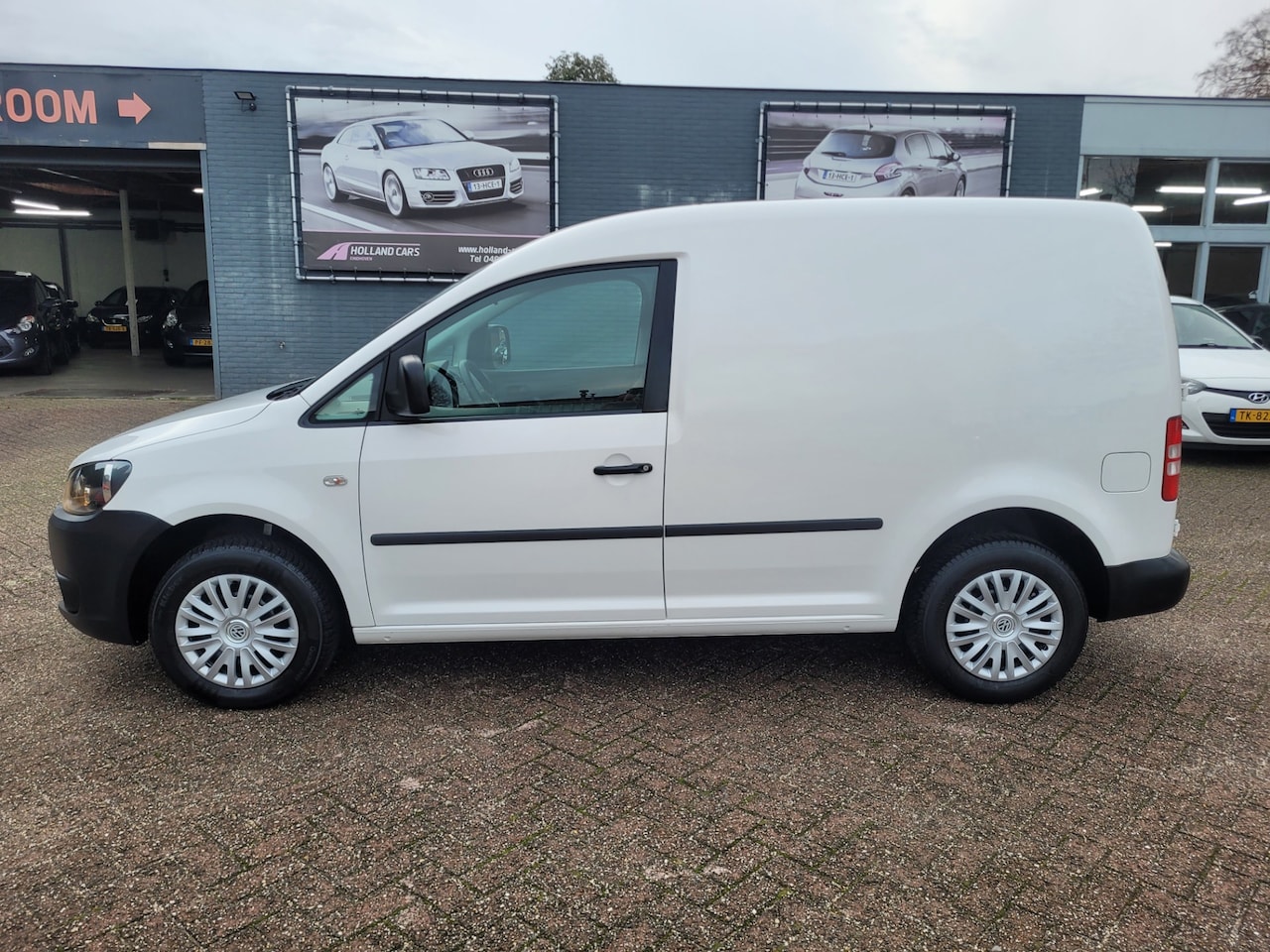 Volkswagen Caddy - 1.6 TDI 216.762 Kilometer n.a.p - Airco - Elektrisch pakket - Handsfree bellen - Trekhaak - AutoWereld.nl