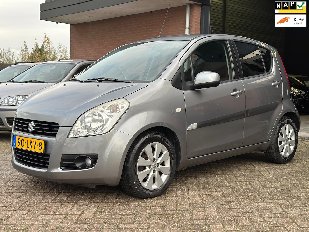 Suzuki Splash - 1.0 Exclusive AIRCO, PARKEERSENSOR, APK!! - AutoWereld.nl