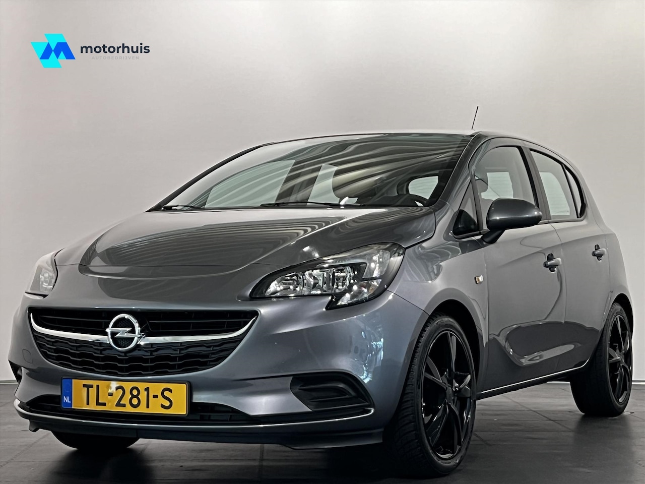 Opel Corsa - 1.4 90pk 5drs Favourite LM - AutoWereld.nl