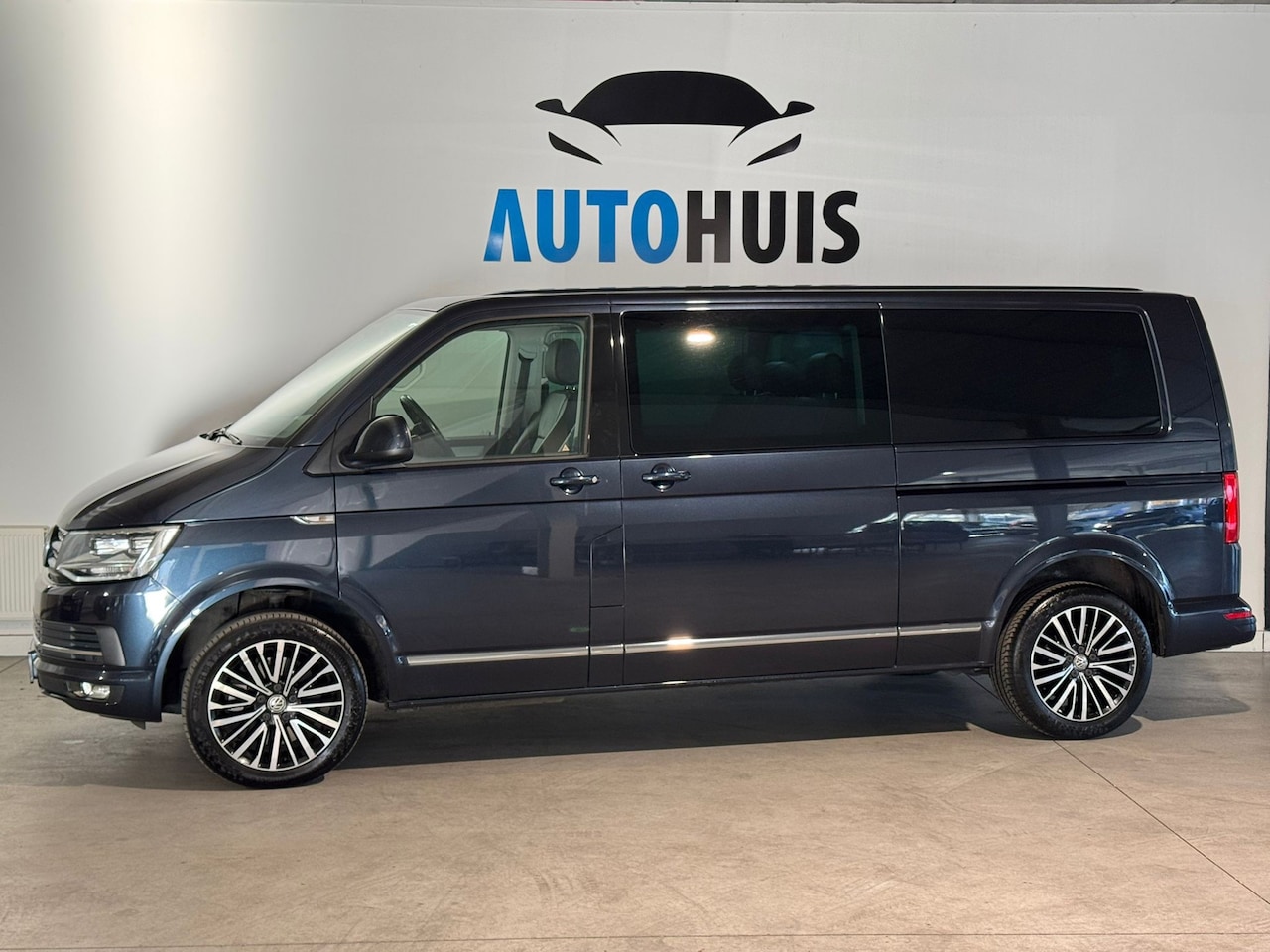 Volkswagen Transporter Caravelle - 2.0 TDI L2H1 Comfortline - AutoWereld.nl