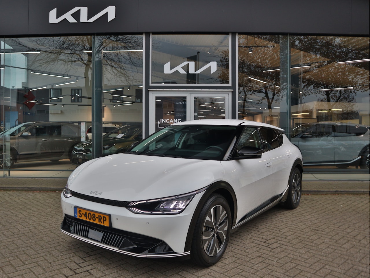 Kia EV6 - Plus 77.4 kWh Navi+BT+Cam Adapt.Cr.Control Leder+Stoelvew. PDC Trekhaak 7 jr. Garantie - AutoWereld.nl