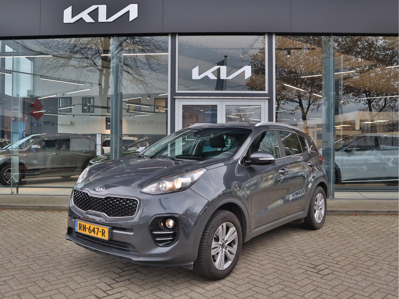 Kia Sportage - 1.6 GDI DynamicLine ECC Cr.Control Navi+Camera BT+USB 17"LMV Trekhaak 7jr.Garantie - AutoWereld.nl