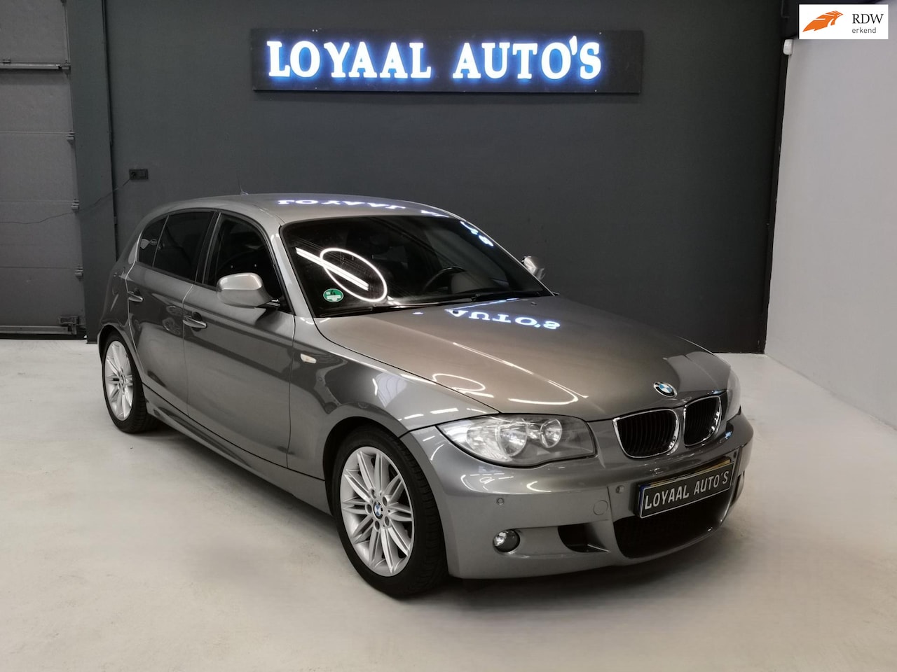 BMW 1-serie - 116i High Executive |M-PAKKET|AIRCO|EL.RAMEN|PDC|APK - AutoWereld.nl