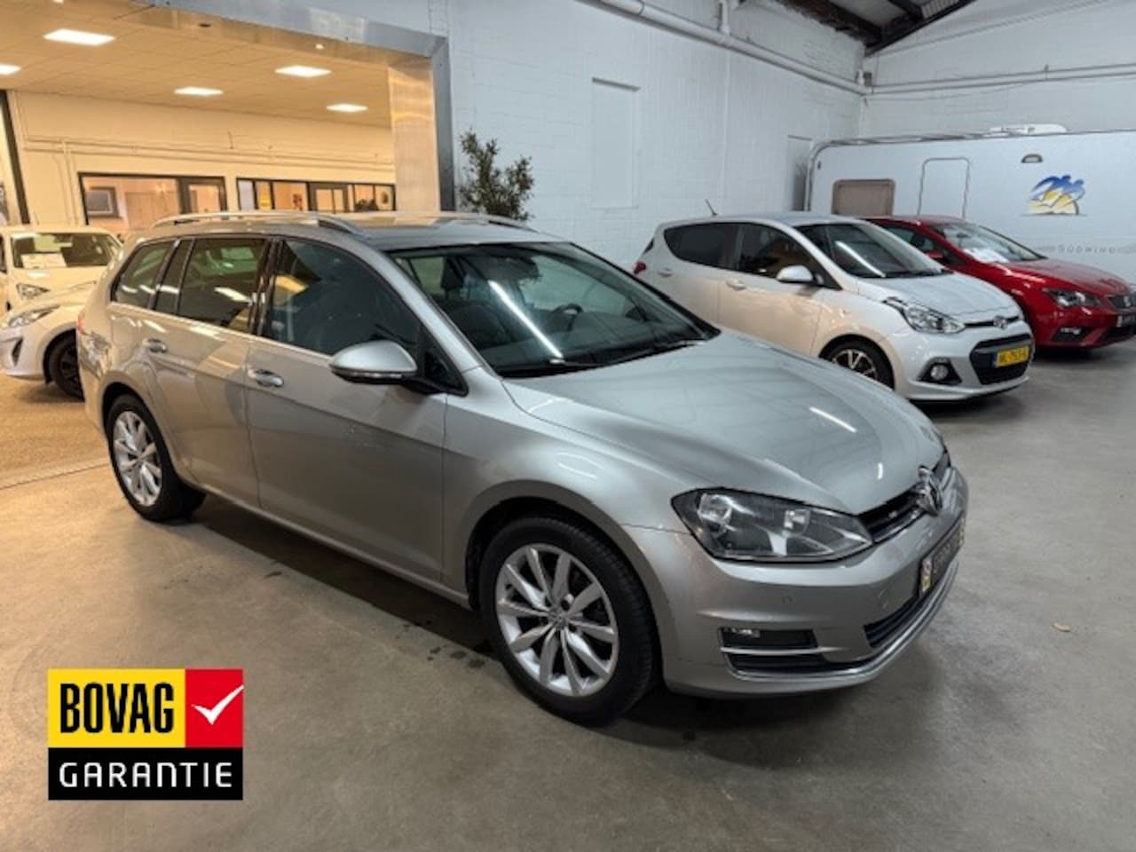 Volkswagen Golf Variant - 1.2 TSI 105pk BMT Business Edition / ECC / HALF-LEDER / CAMERA - AutoWereld.nl