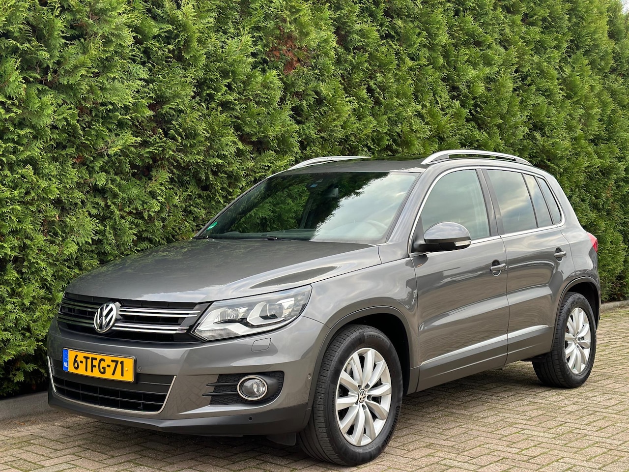 Volkswagen Tiguan - 1.4 TSI Sport&Style Trekhaak Panorama - AutoWereld.nl