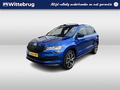 Skoda Karoq - 1.5 TSI ACT Sportline Business / AUTOMAAT/ TREKHAAK/ PANO/ DCC/ CANTON AUDIO/ CAMERA/ PARK