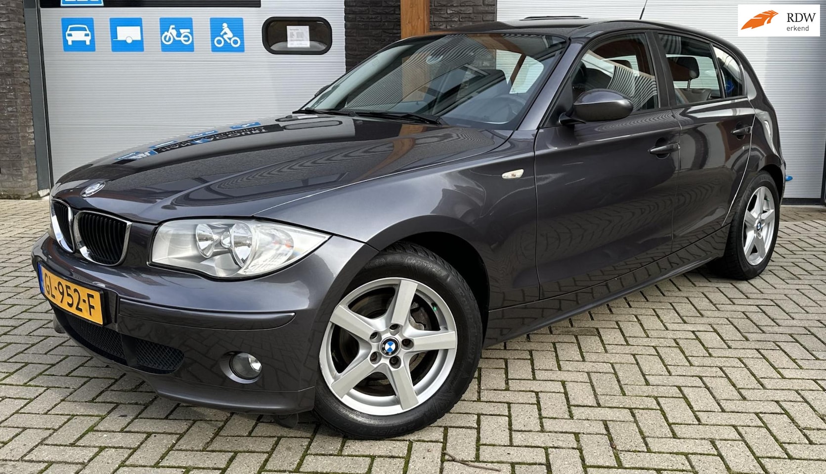 BMW 1-serie - 116i High Executive LEDER/CRUISE/AIRCO/PDC/5DRS - AutoWereld.nl