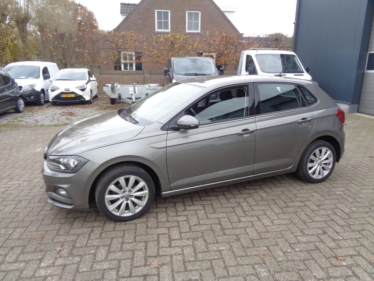 Volkswagen Polo - 1.0 TSI Comfortline airco, navigatie, carplay, cruise, android auto, LM velgen - AutoWereld.nl