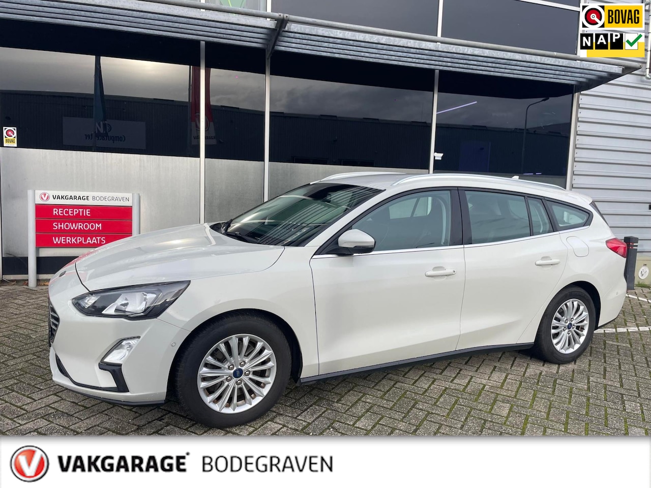 Ford Focus Wagon - 1.0 EcoBoost Titanium Business / camera / trekhaak - AutoWereld.nl