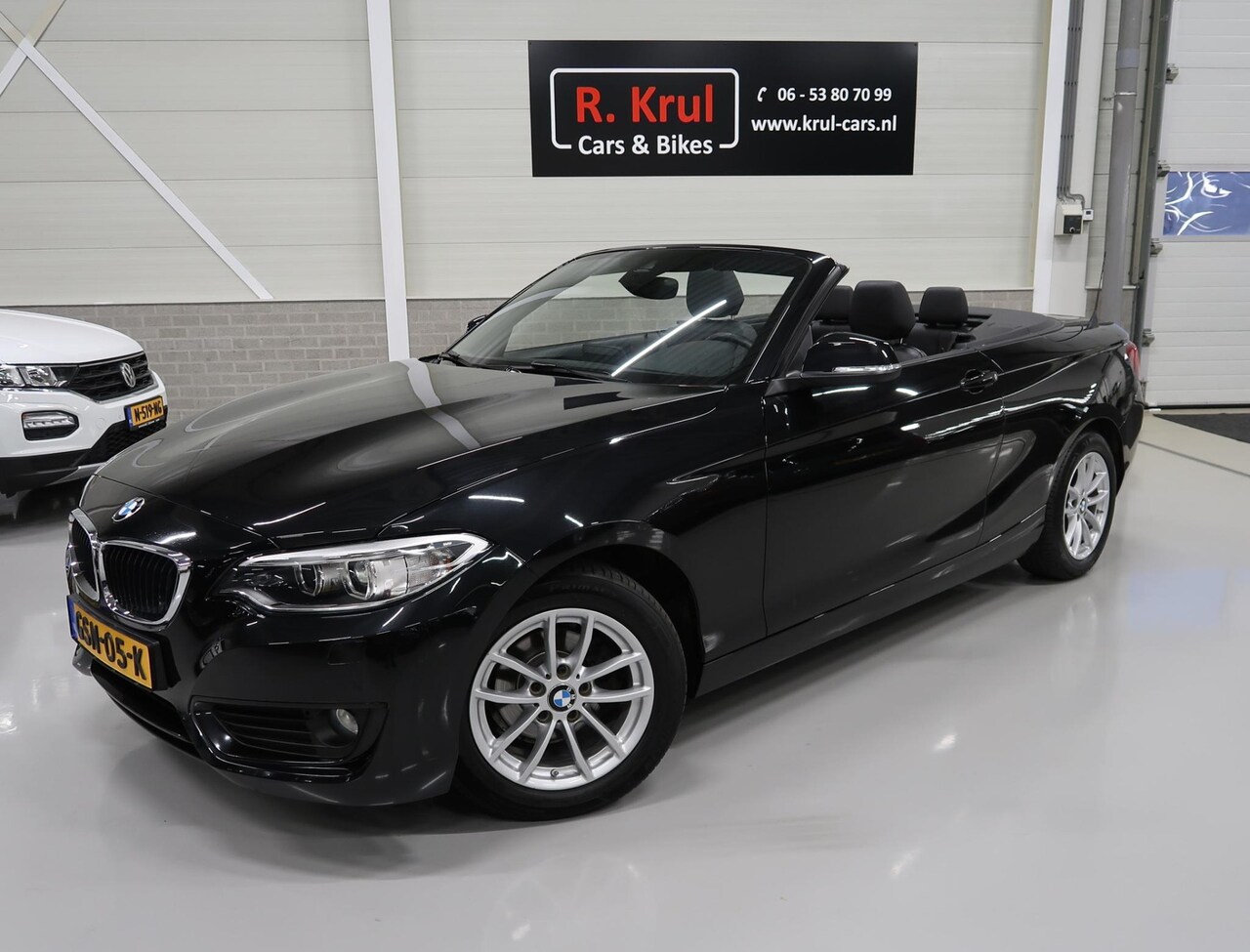 BMW 2-serie Cabrio - 218i Centennial Leer Airco Navigatie 1e Eigenaar Sportvelgen Cruise control Stoelverwarmin - AutoWereld.nl