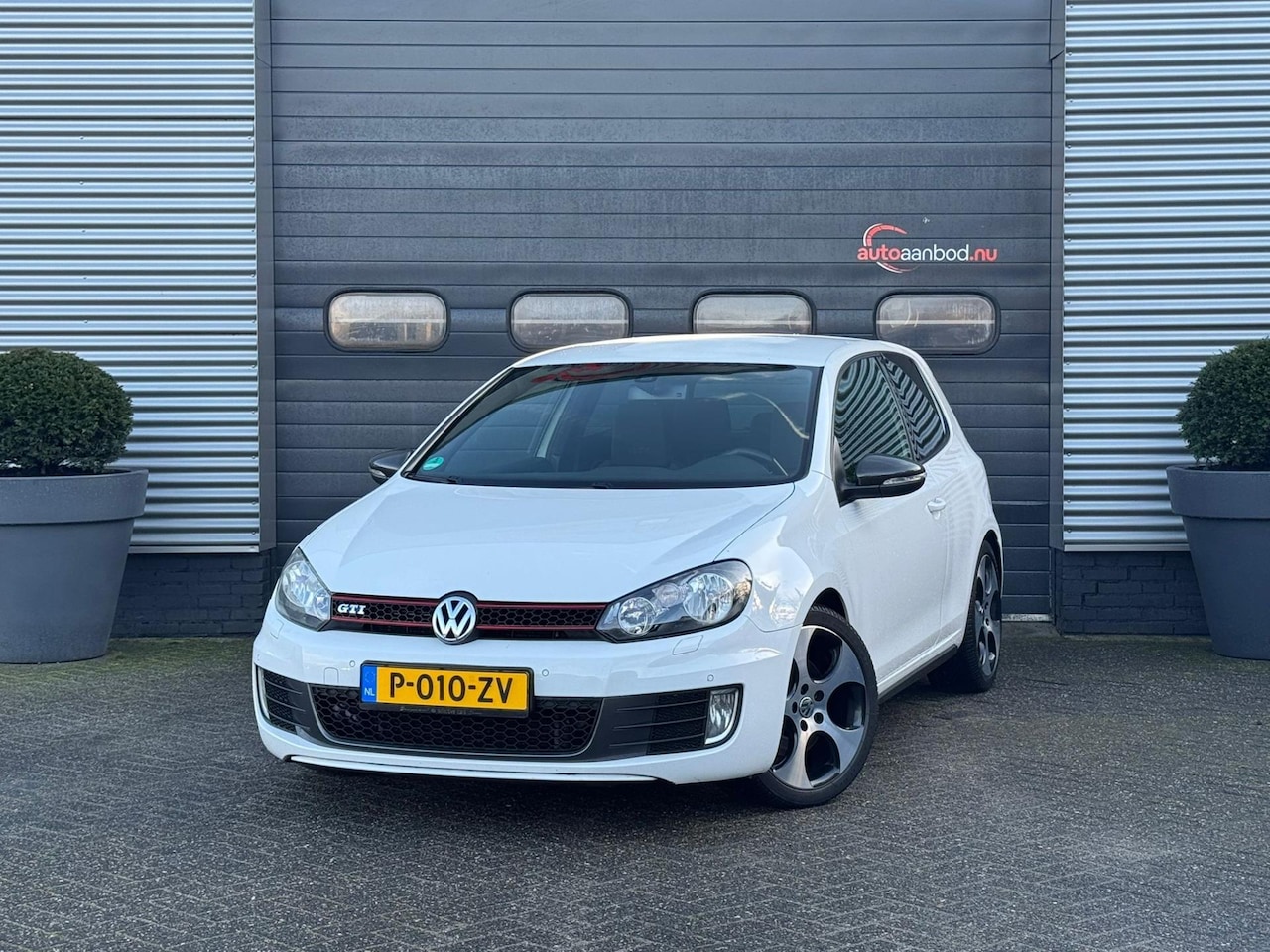 Volkswagen Golf - 2.0 GTI 211 PK | Carbon | Parkeersensoren | Climate Control | Stoelverwarming | - AutoWereld.nl