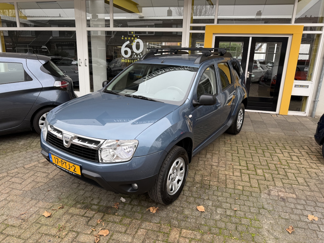 Dacia Duster - 1.6 Lauréate N TREKHAAK CPV ELEKTRISCHE RAMEN - AutoWereld.nl