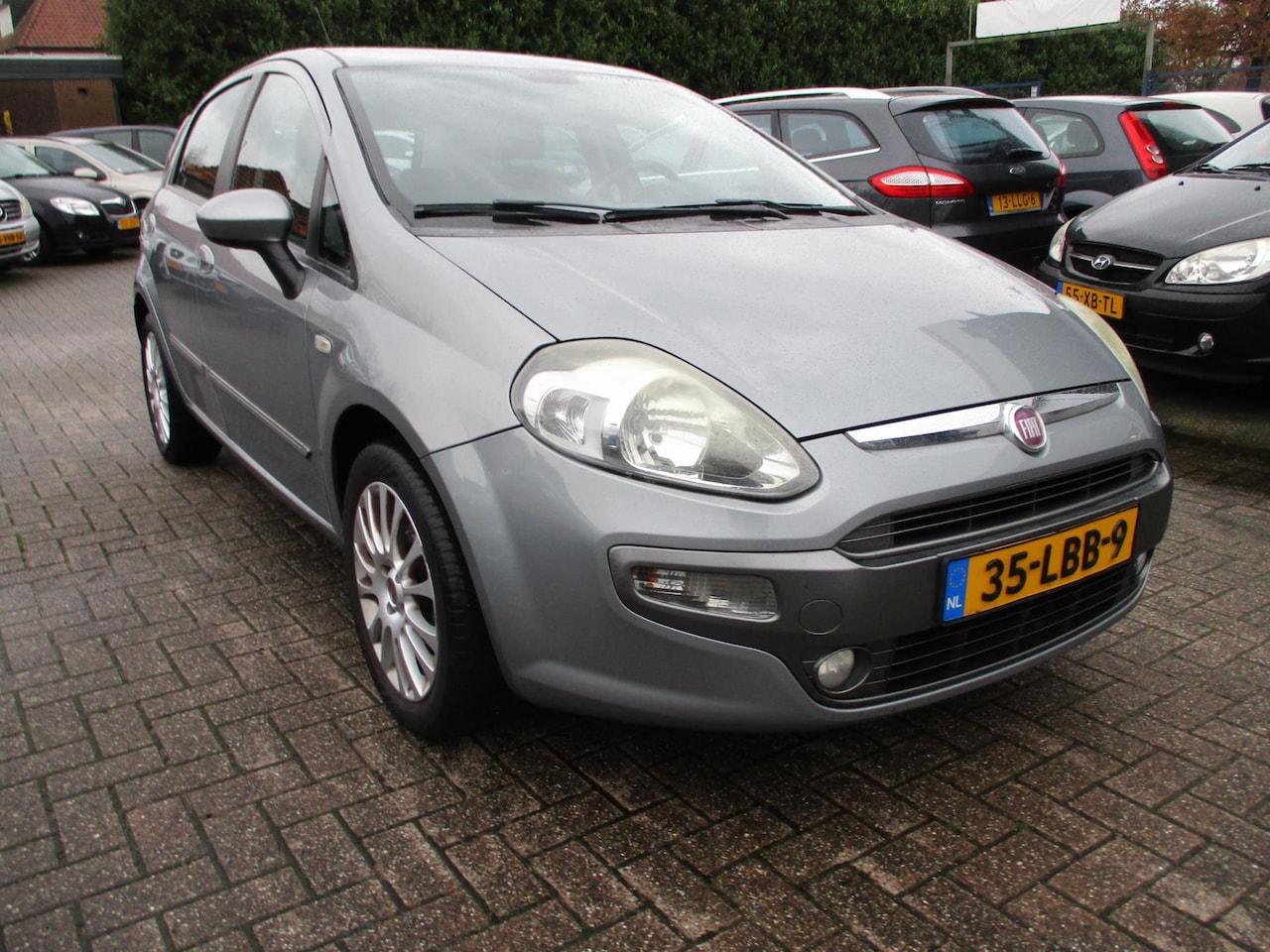 Fiat Punto Evo - 1.4-16V AIRCO! CRUISE! TREKHAAK! - AutoWereld.nl