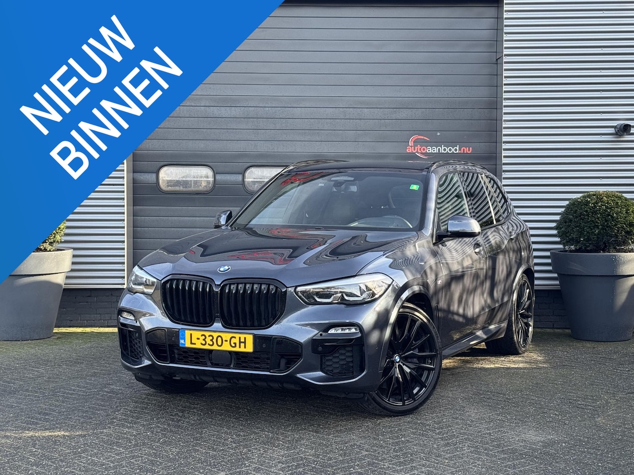 BMW X5 - xDrive30d High Executive 7p. | M-Sport | Luchtvering | 22 Inch Lichtmetalen Velgen | Stoel - AutoWereld.nl