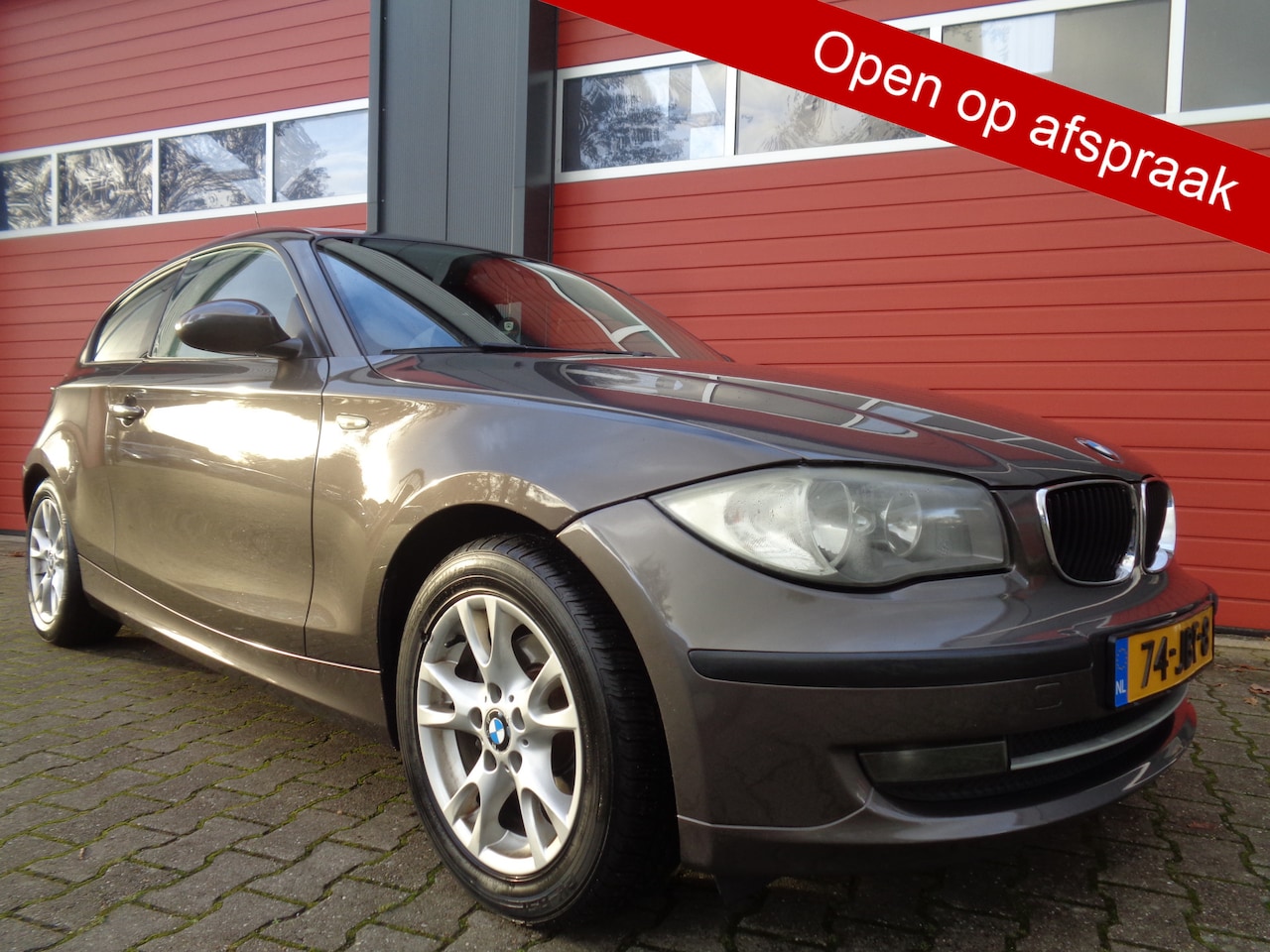 BMW 1-serie - 118i Business Line 143PK Clima Cruise LMV 6-BAK NL-Auto - AutoWereld.nl