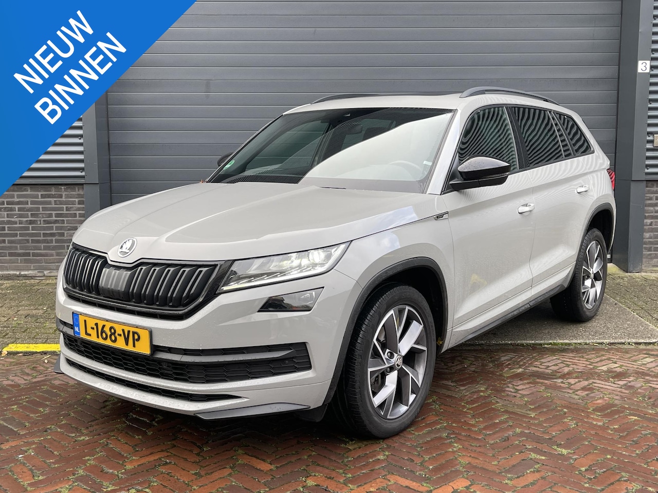 Skoda Kodiaq - 1.5 TSI SPORTLINE BUSINESS 7P I SCHUIF/KANTELDAK I APPLE/ANDROID I ADAPTIEVE CRUISE CONTRO - AutoWereld.nl