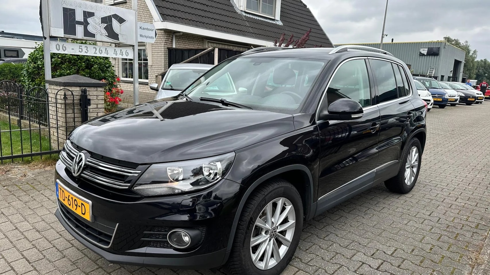 Volkswagen Tiguan - 1.4 TSI Sport&Style - AutoWereld.nl