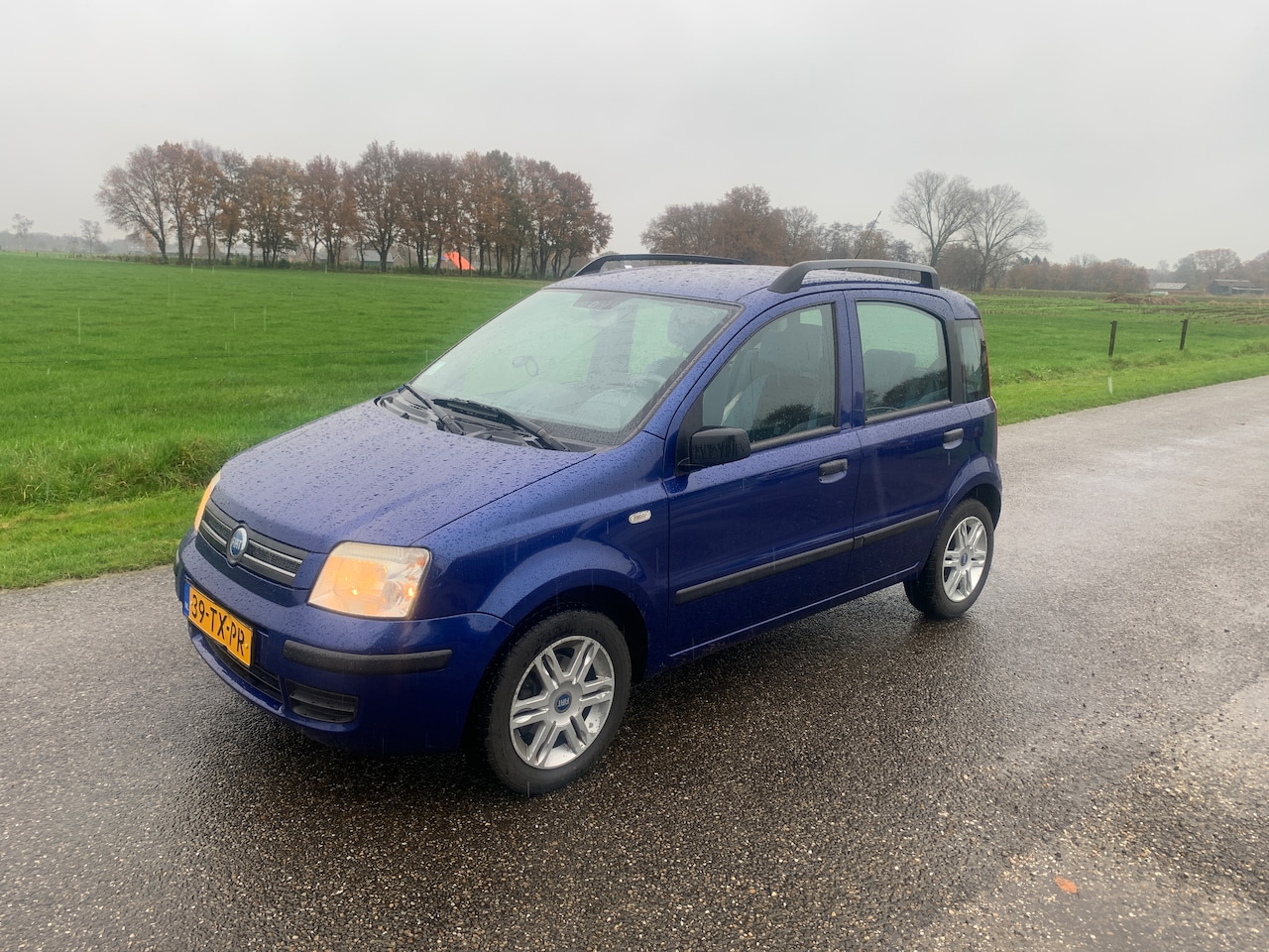 Fiat Panda - 1.2 Emotion AUTOMAAT Perfect onderhouden, prachtige kleur, Nw. allseason banden. - AutoWereld.nl