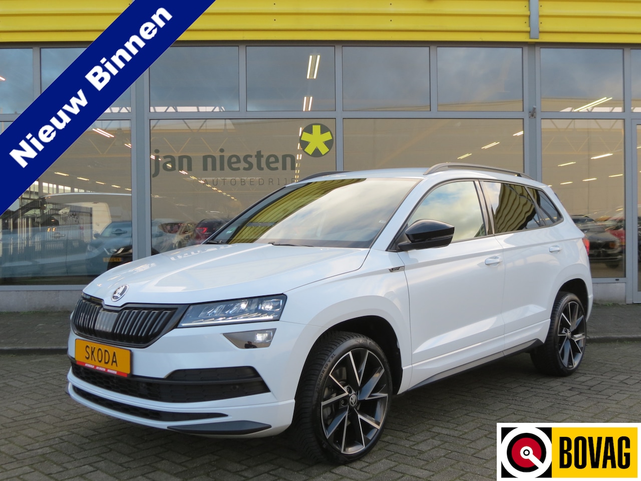 Skoda Karoq - 1.5 TSI ACT Sportline | Automaat | Stuurwiel- & Stoelverwarming | Camera | Rijklaarprijs i - AutoWereld.nl