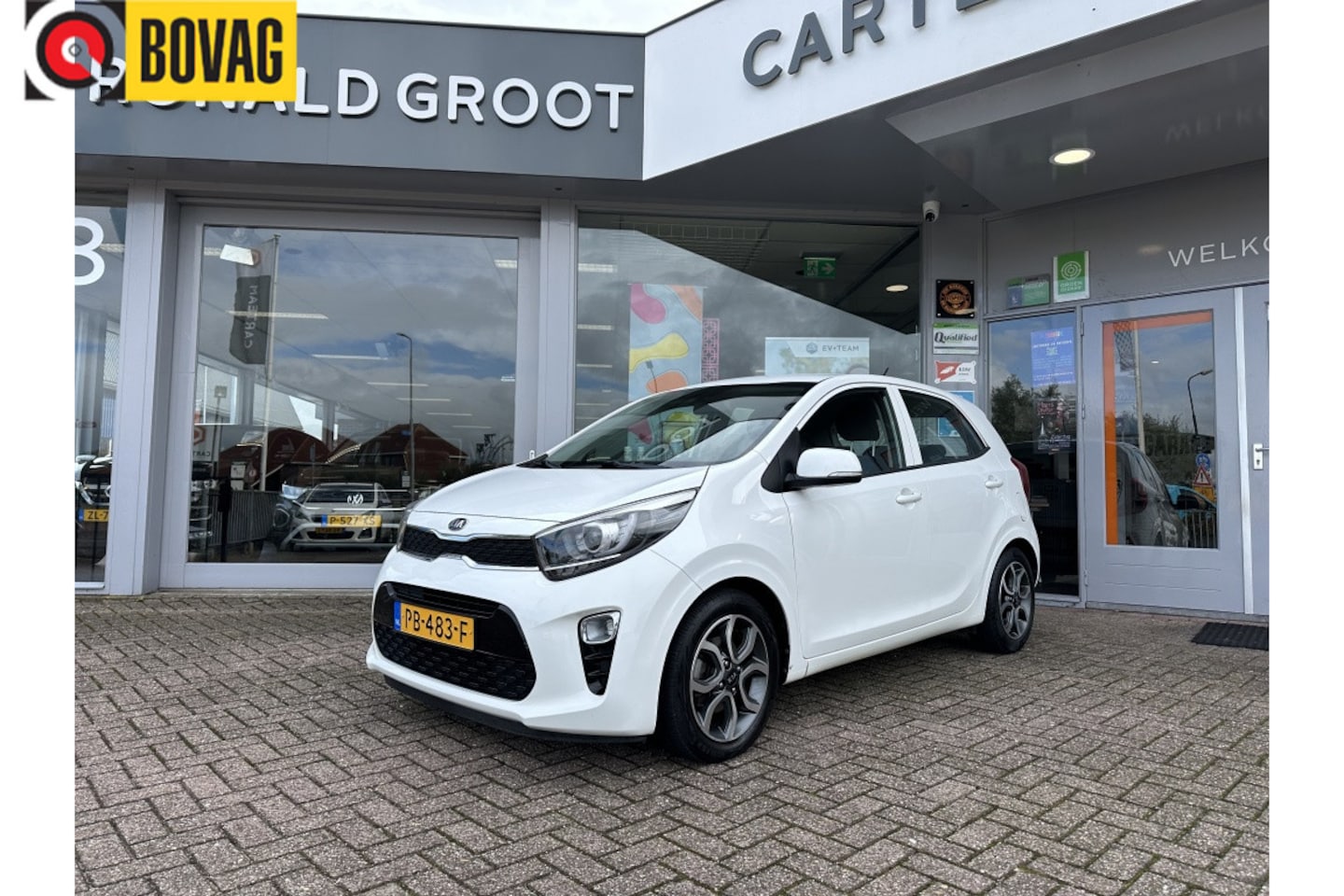 Kia Picanto - 1.0 CVVT First Ed. | Airco | Cruise | Camera | Carplay - AutoWereld.nl