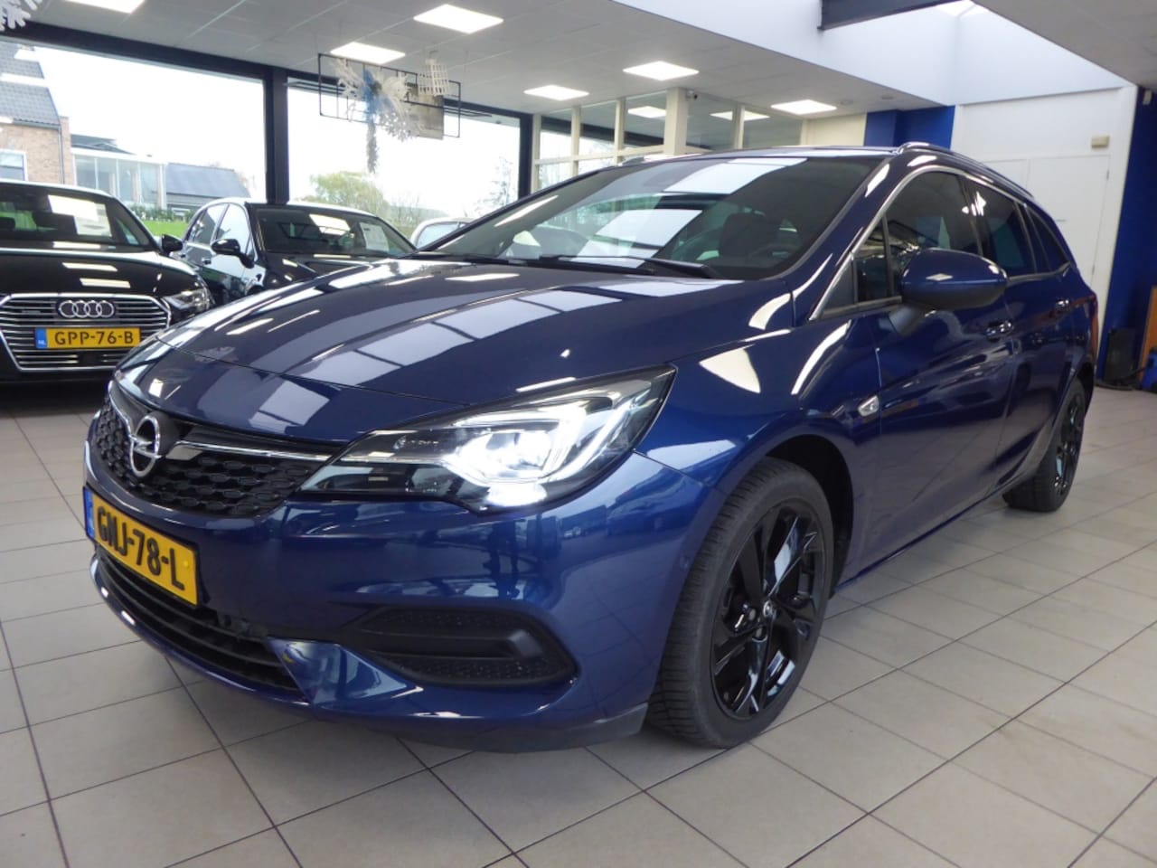 Opel Astra Sports Tourer - 1.2 Bns Elegance - AutoWereld.nl