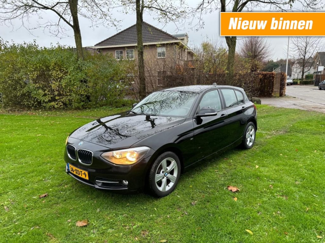 BMW 1-serie - 116 I  5 drs automaat - navigatie - ecc - AutoWereld.nl