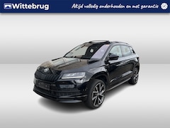 Skoda Karoq - 1.5 TSI ACT Sportline / AUTOMAAT/ PANO/ TREKHAAK/ CAMERA/ PARK. SENSOREN/ LED/ DODE HOEK/