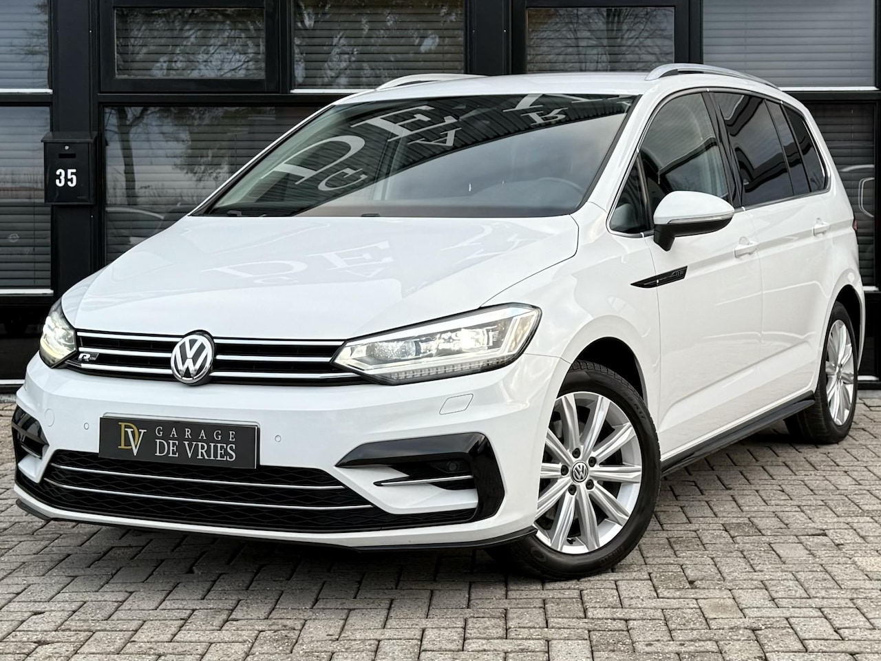 Volkswagen Touran - 1.4 TSI DSG R-Line Adaptieve Cruise Garantie - AutoWereld.nl