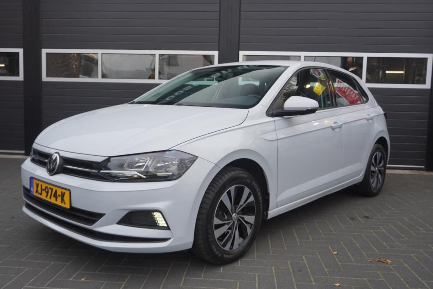 Volkswagen Polo - 1.0 TSI Airco/CC/Navi Carplay/Camera - AutoWereld.nl