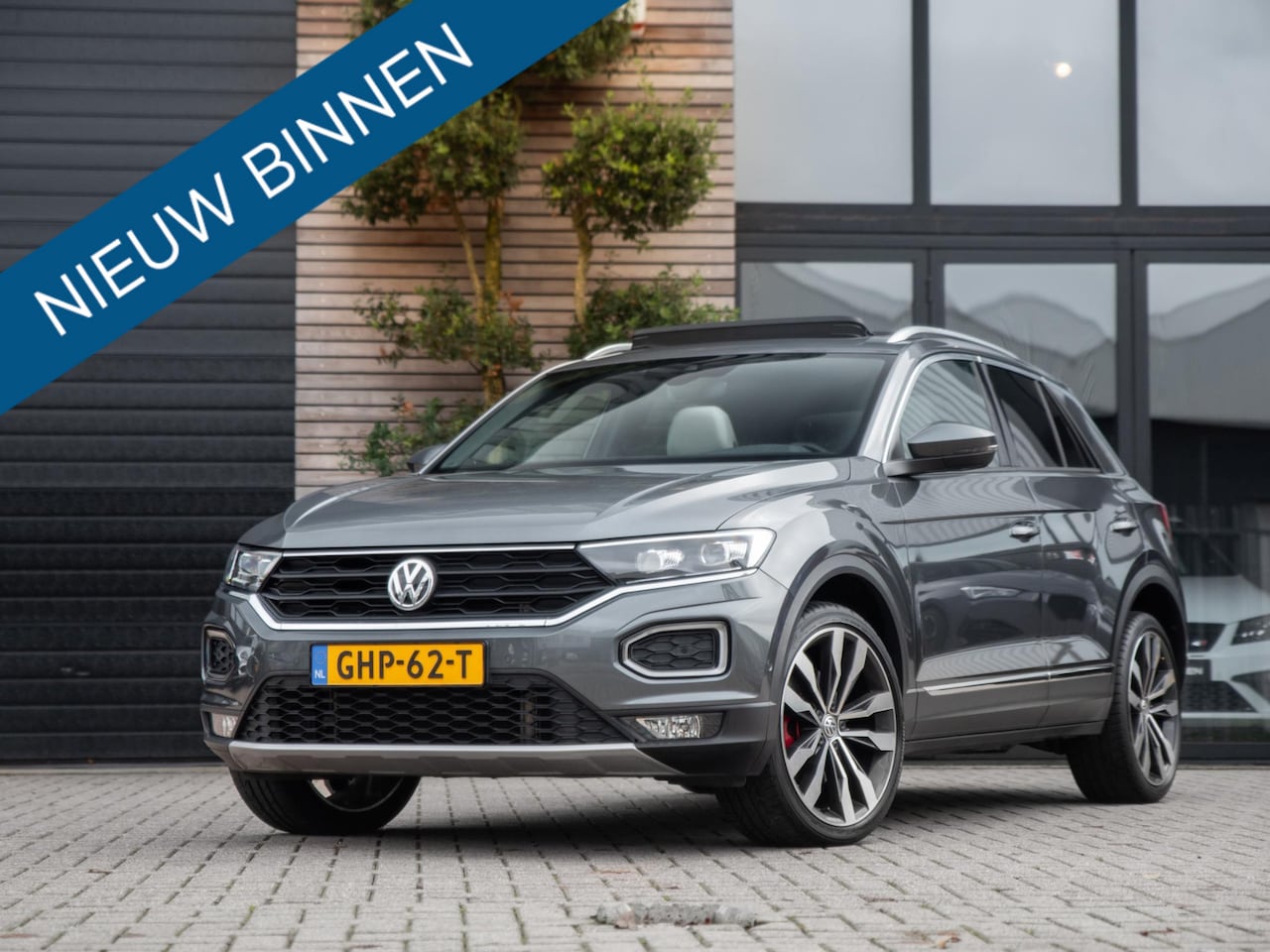 Volkswagen T-Roc - 2.0 TSI 4Motion Sport Pano Leer Virtual ACC - AutoWereld.nl