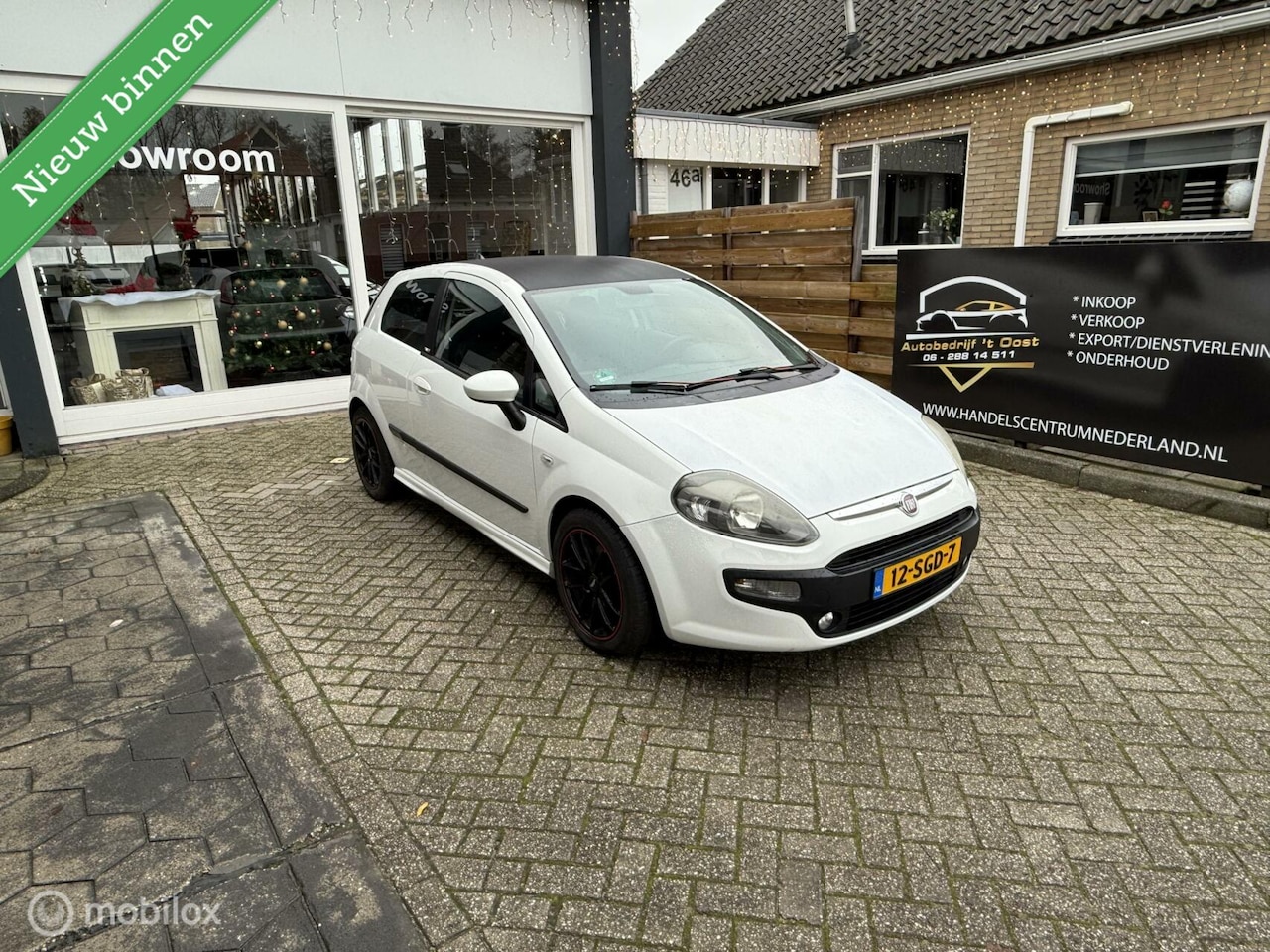 Fiat Punto Evo - 1.3 M-Jet Dynamic| lange apk, trekhaak, airco - AutoWereld.nl