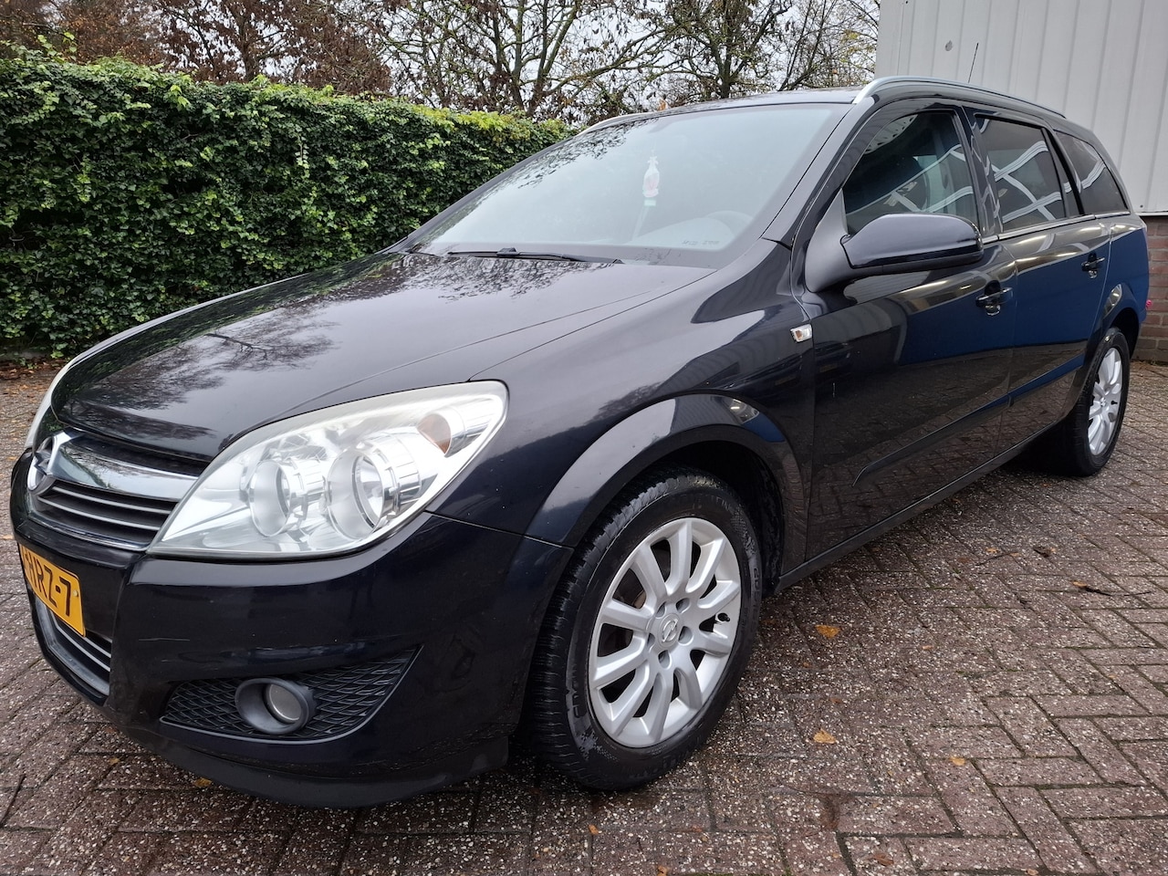 Opel Astra Wagon - 1.6 Temptation AIRCO/CRUISE/PDC.A/NAVI/TREKHAAK 116PK - AutoWereld.nl