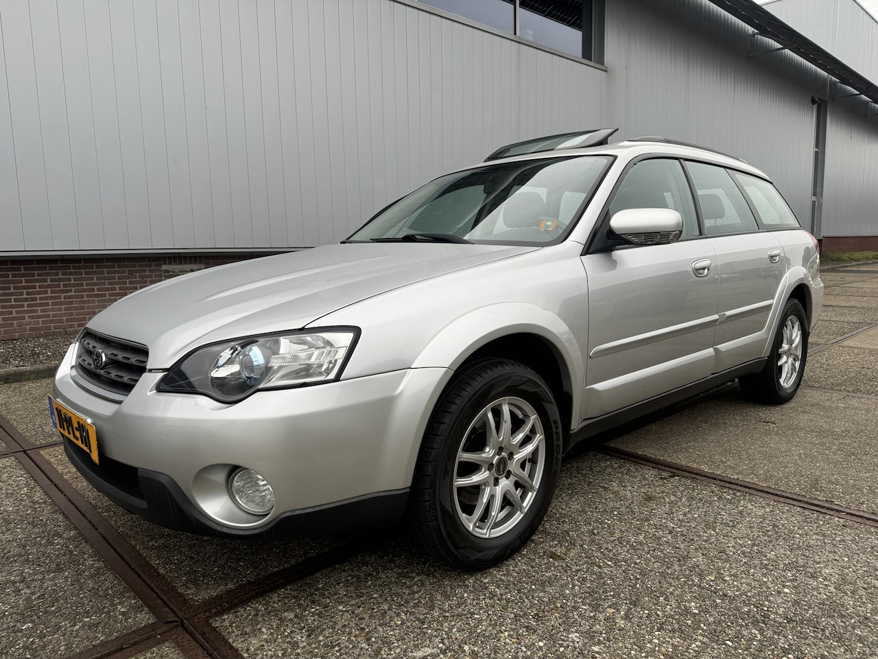 Subaru Outback - 2.5i AWD Autom/Tiptr Panorama/Clima/Cruise/Trekhaak - AutoWereld.nl