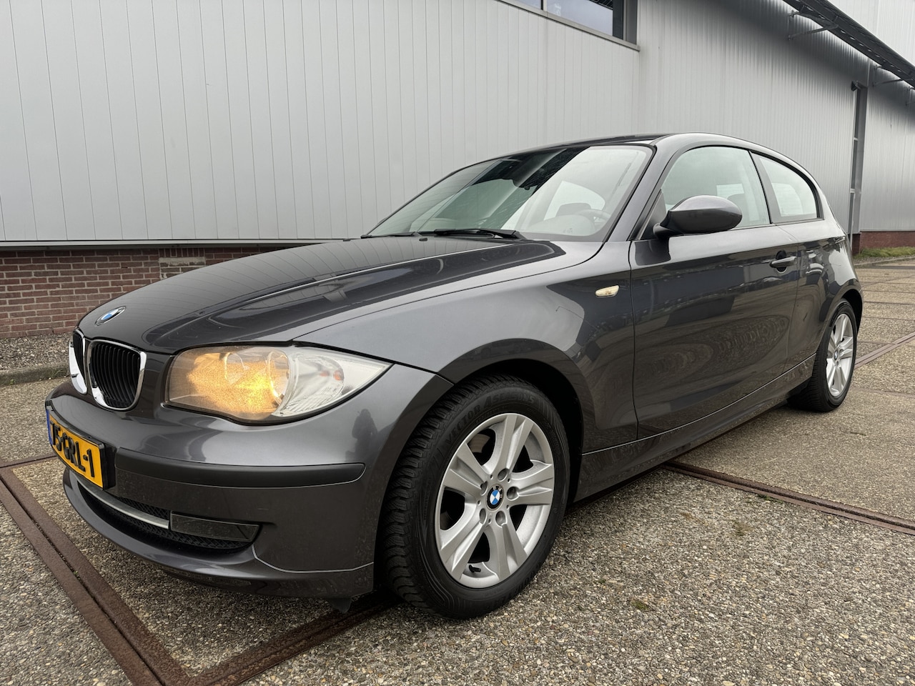 BMW 1-serie - 118i Autom/Tiptr Business Line Airco/LMV - AutoWereld.nl