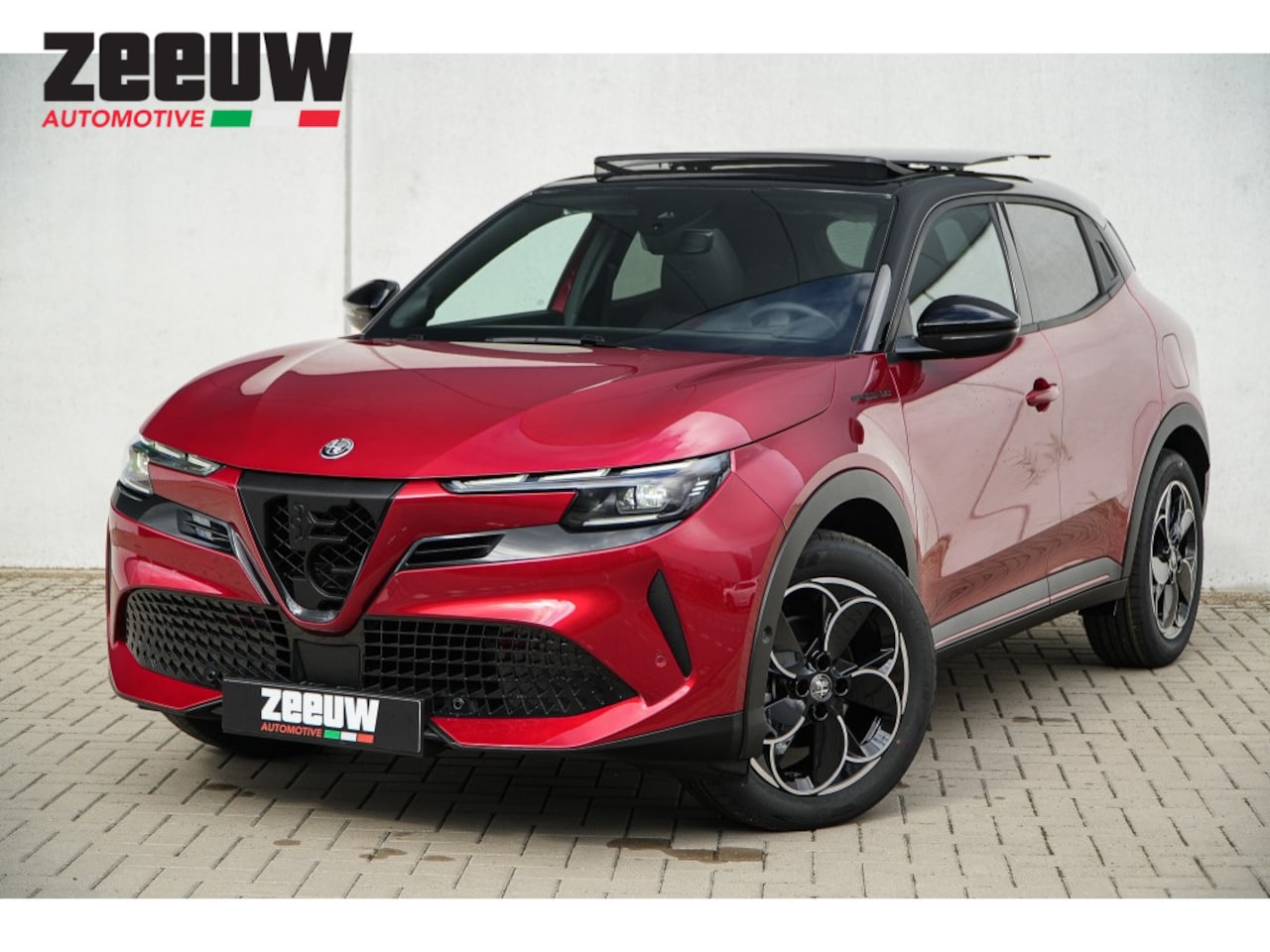 Alfa Romeo Junior - Elettrica Speciale 54 kWh | Pano | Techno | Brera Red - AutoWereld.nl