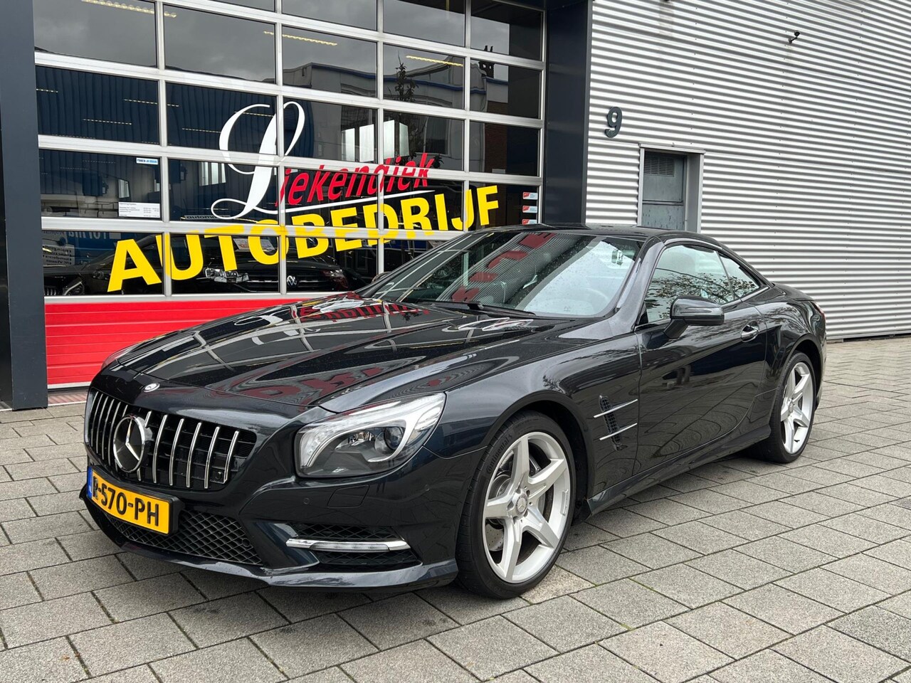 Mercedes-Benz SL-klasse Cabrio - 350 Panorama dak I Navigatie I Leer I 53.000 KM I Dealer onderhouden - AutoWereld.nl