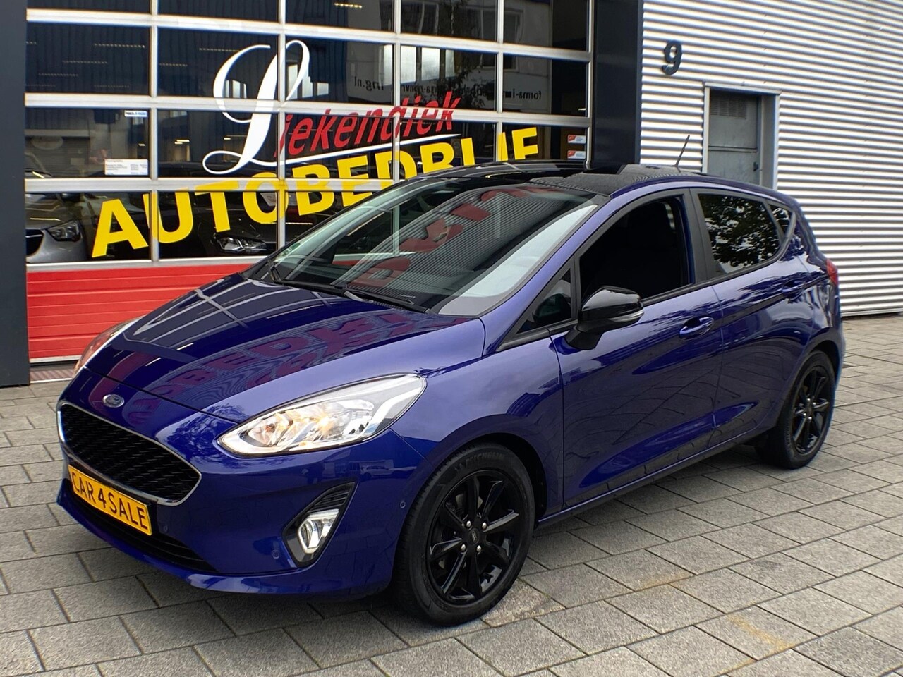 Ford Fiesta - 1.0 EcoBoost Cool - Navigatie / Apple CarPlay I Airco I Veiligheids pakket I Sport velgen - AutoWereld.nl