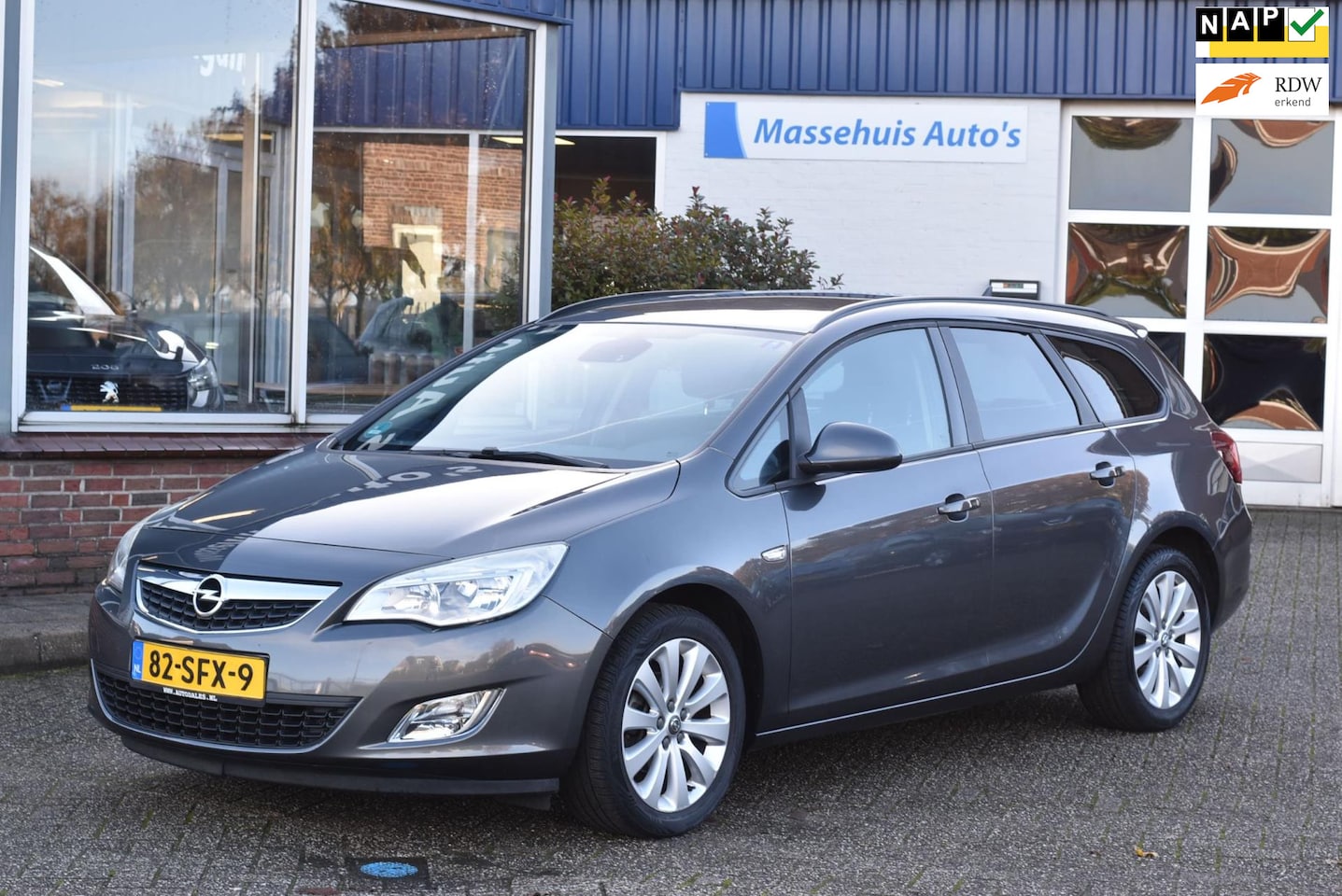 Opel Astra Sports Tourer - 1.4 Turbo Cosmo 140pk Navi Cruise Clima PDC 17" all-season Nwe APK - AutoWereld.nl