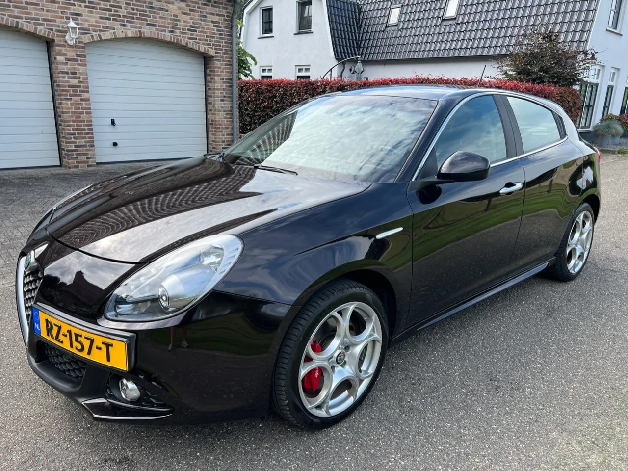 Alfa Romeo Giulietta - 1.4 Turbo MultiAir Super BRUIN-LEER.NAVI.NAP! - AutoWereld.nl