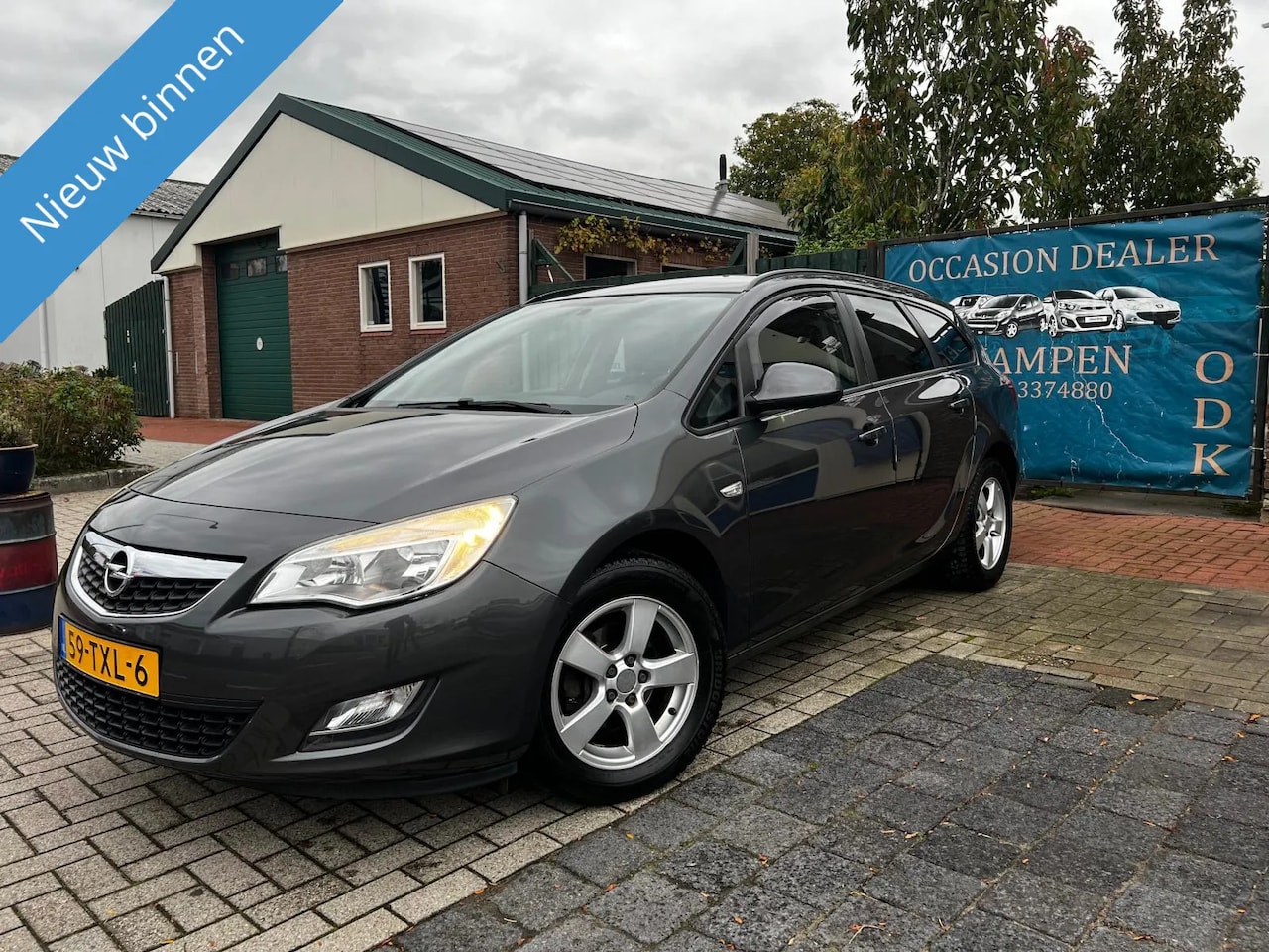 Opel Astra Sports Tourer - 1.4 Turbo Business Edition NAP|NAVIGATIE|CLIMATE|PDC| - AutoWereld.nl