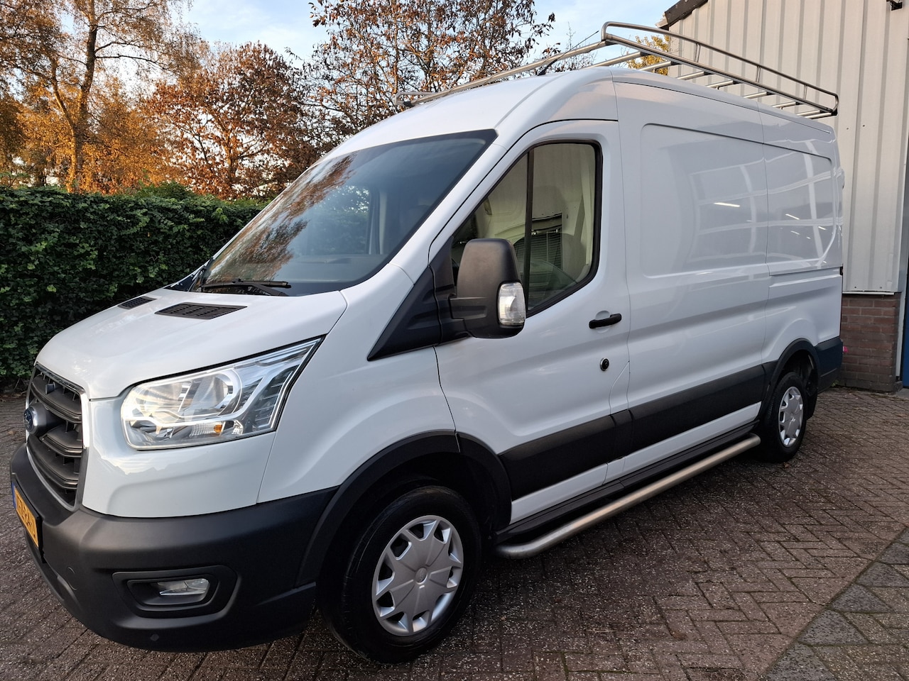 Ford Transit - 290 2.0 TDCI L2H2 AIRCO/CRUISE/PDC/TREKHAAK/LED/3-ZITS 107PK - AutoWereld.nl