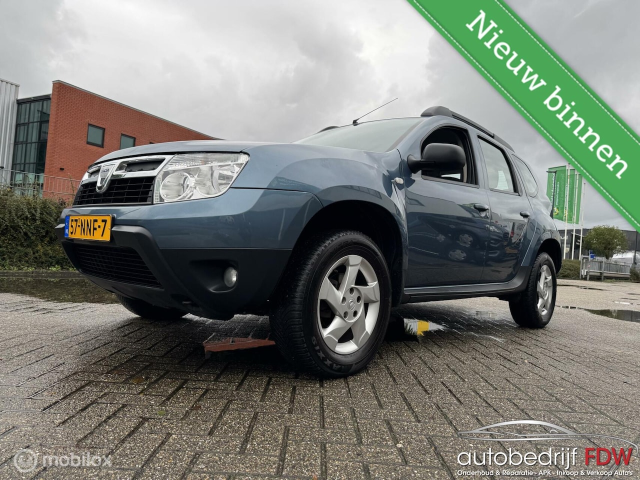 Dacia Duster - 1.6 Lauréat 2wd/TREKHAAK/AIRCO/ELEKTR.RAMEN/NAP - AutoWereld.nl