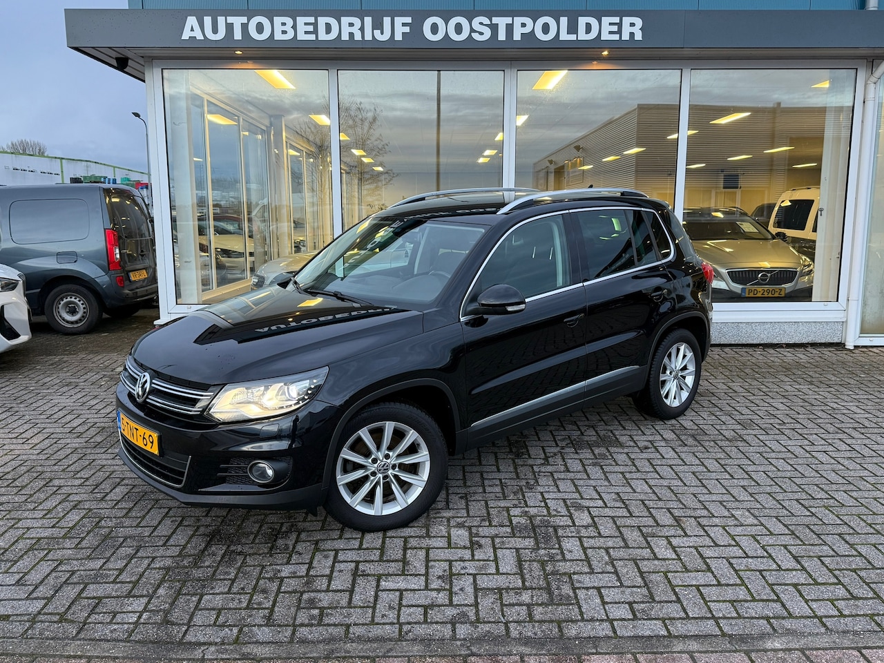 Volkswagen Tiguan - 1.4 TSI Sport&Style - AutoWereld.nl